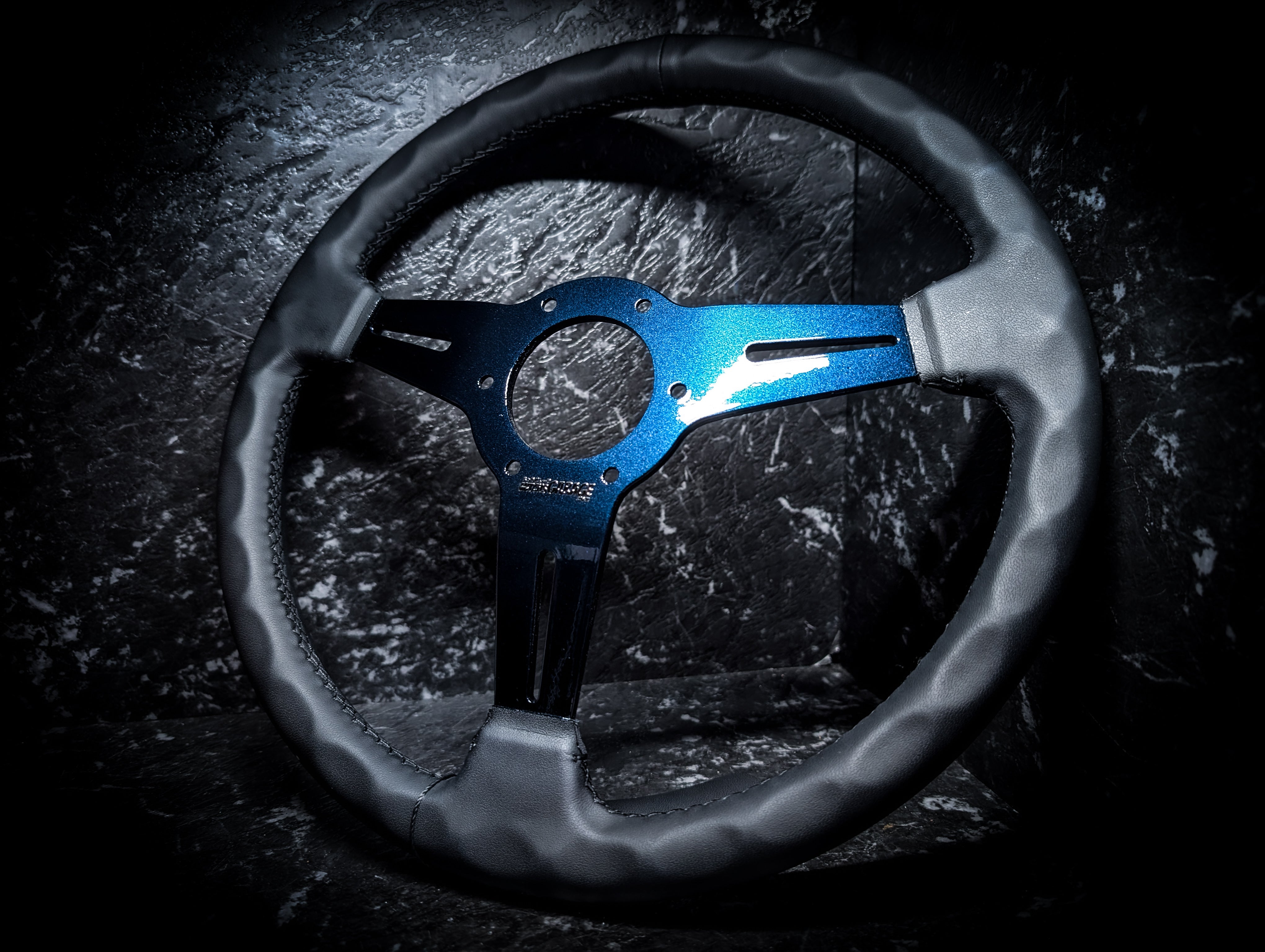 Midnight Blue Metallic • Triple Black Leather Standard Steering Wheel