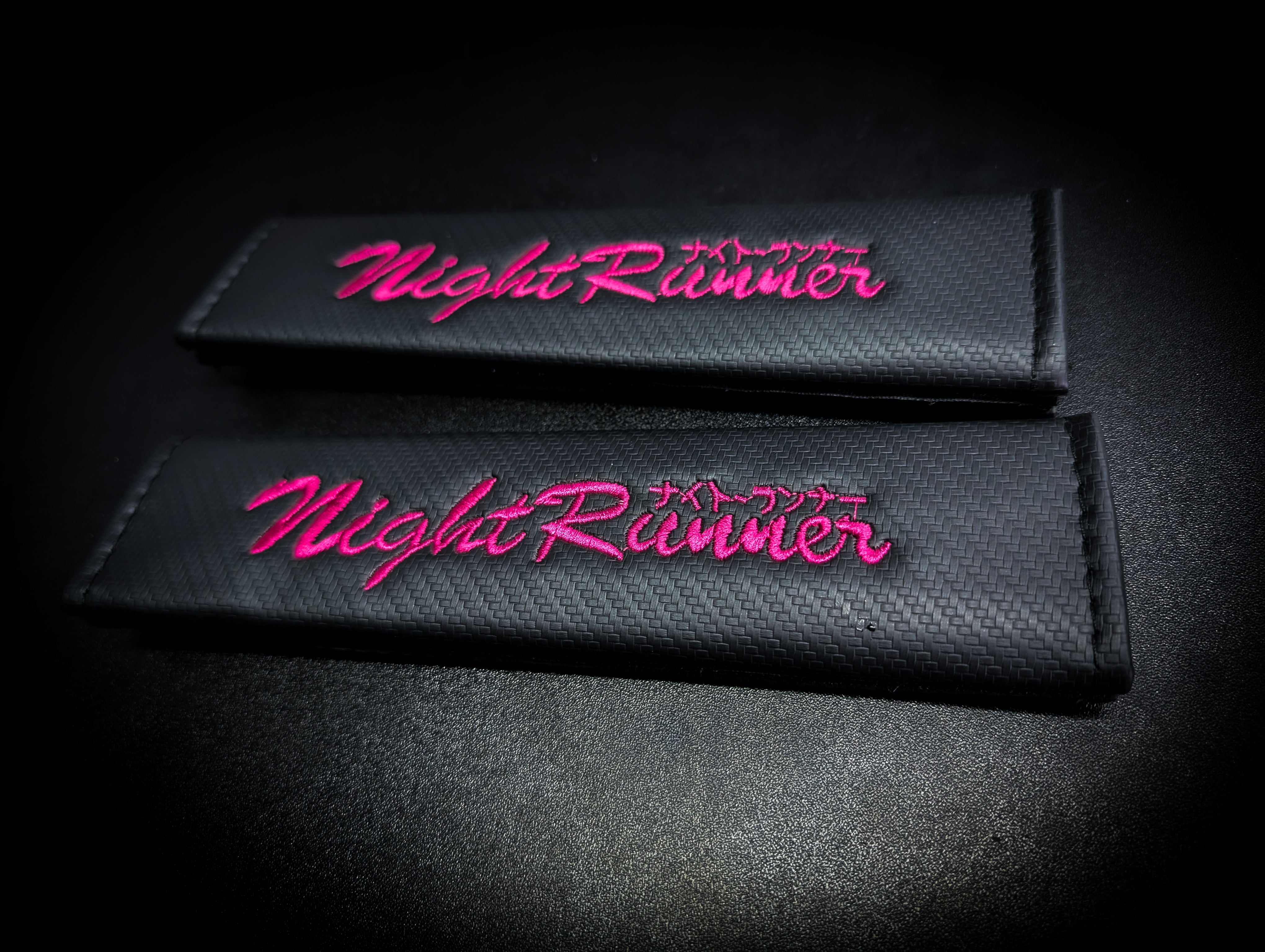 Pink Night Runner Embroidered Black Carbon Seat Belt Covers