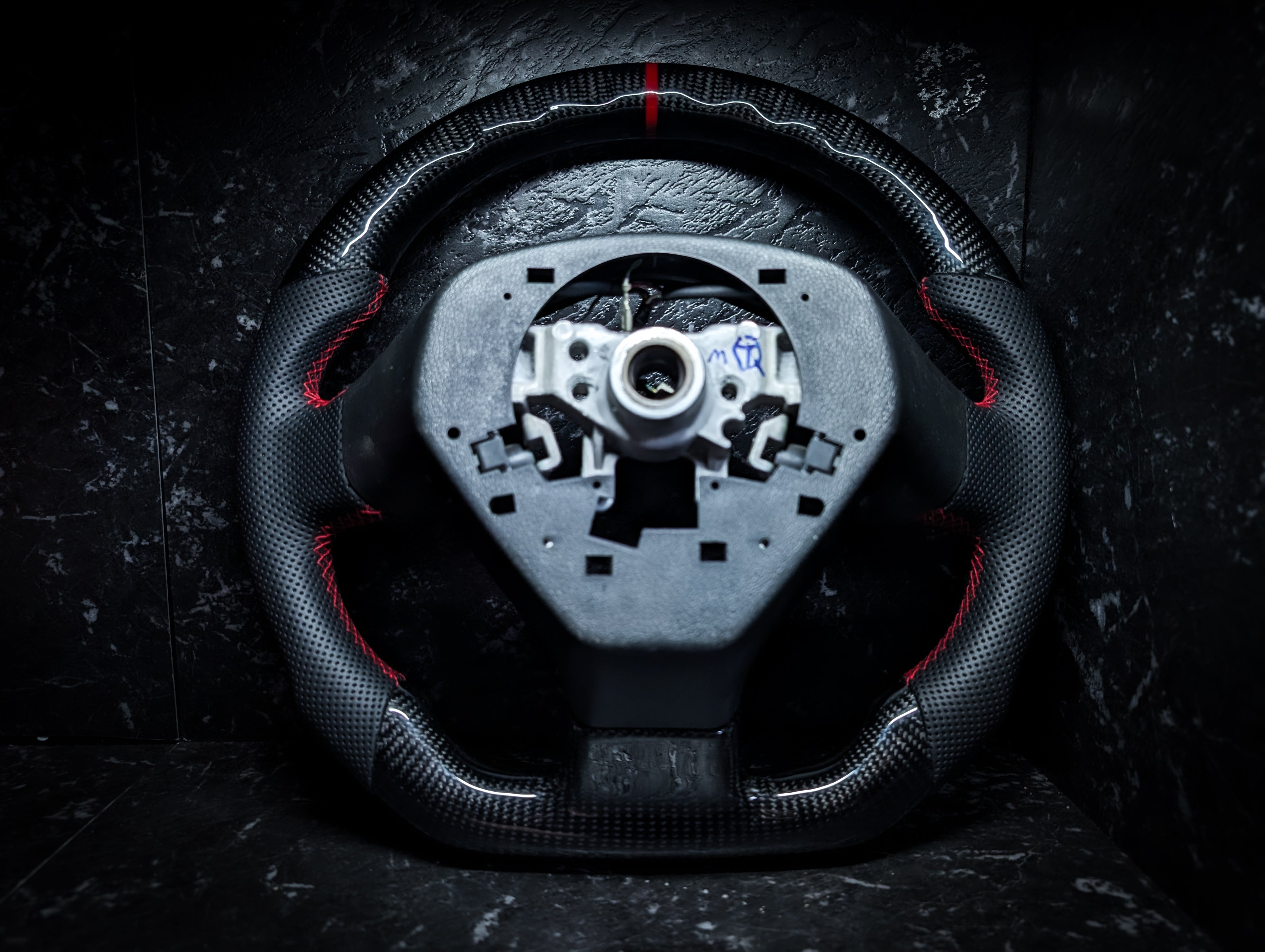 RED | Carbon Fibre Re-Trimmed Perforated Leather and D Shaped Subaru 2008-2013 Sports Steering Wheel