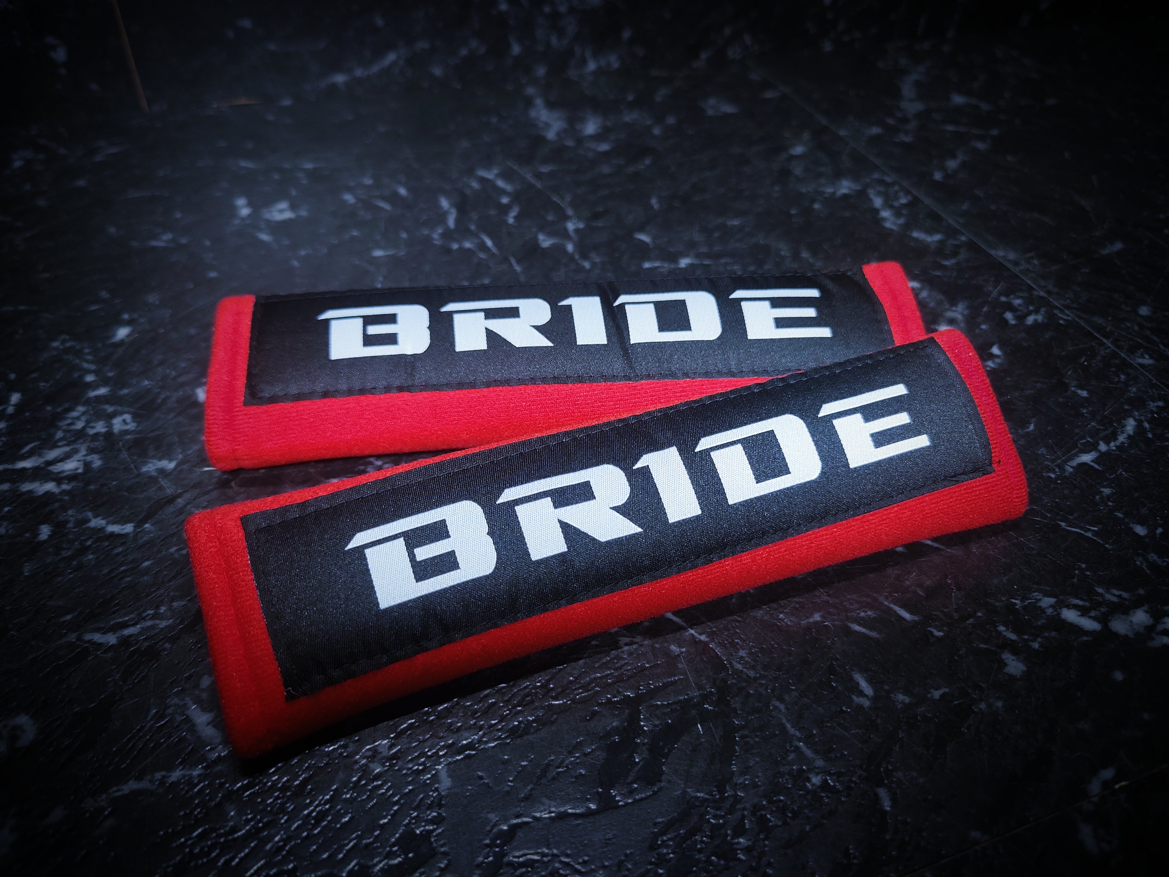 BRIDE Red Seat Belt Covers
